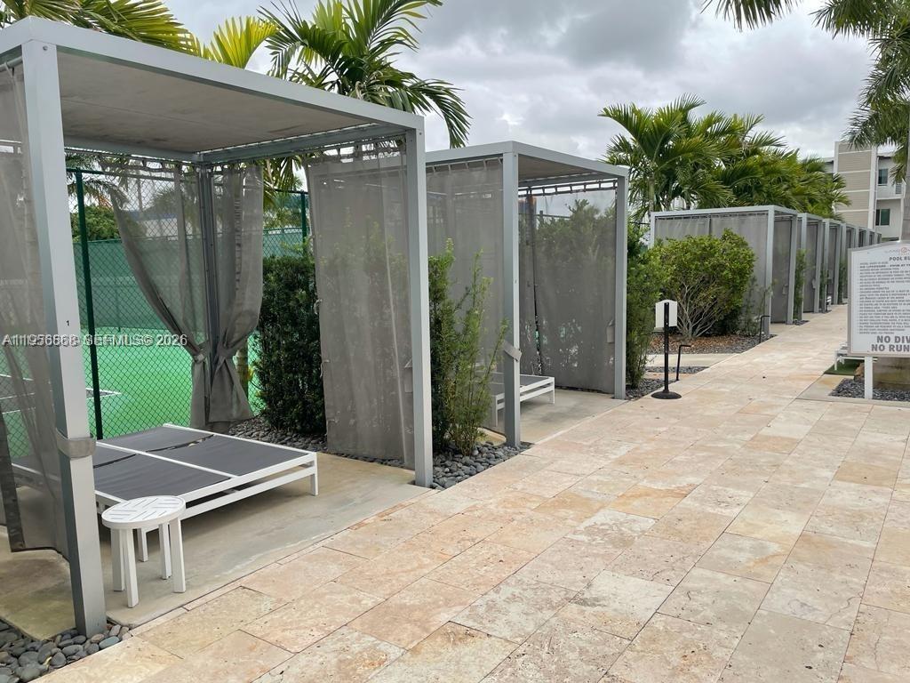 6453 Northwest 102nd Path, Unit 303 Doral, FL 33178 - Photo 37 of 39 a view of outdoor space yard and porch