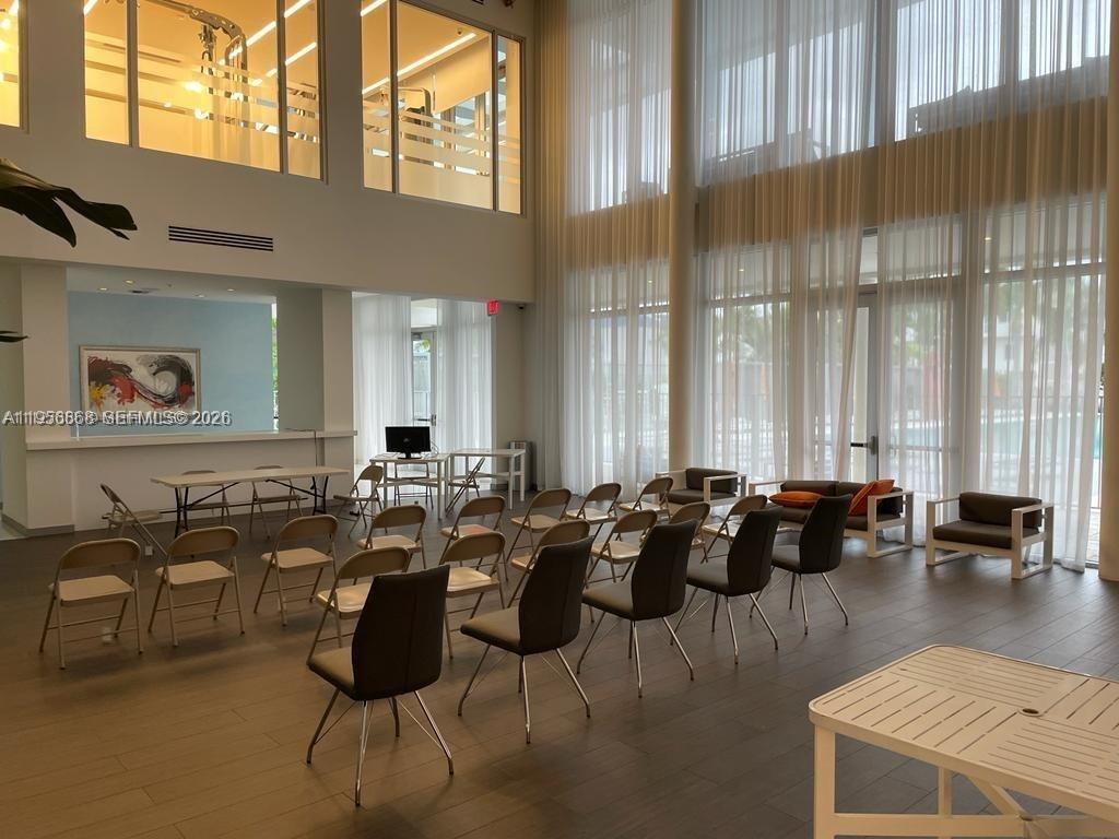 6453 Northwest 102nd Path, Unit 303 Doral, FL 33178 - Photo 39 of 39 a room with lots of chairs and mirrors