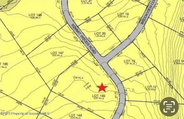 a view of a wooden floor and a sign