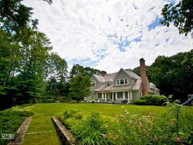 41 Hemlock Ridge Weston, CT 06883 - Photo 1 of 1 a front view of a house with garden