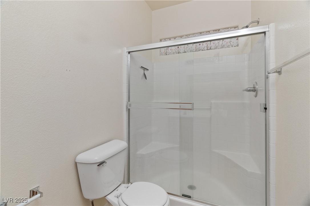 2715 Brinkley Manor Street Laughlin, NV 89029 - Photo 27 of 89 Full Primary Bath with toilet and a stall shower
