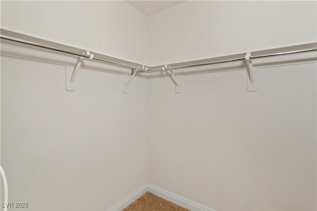 2715 Brinkley Manor Street Laughlin, NV 89029 - Photo 34 of 89 Spacious closet in Second Bedroom with carpet floors