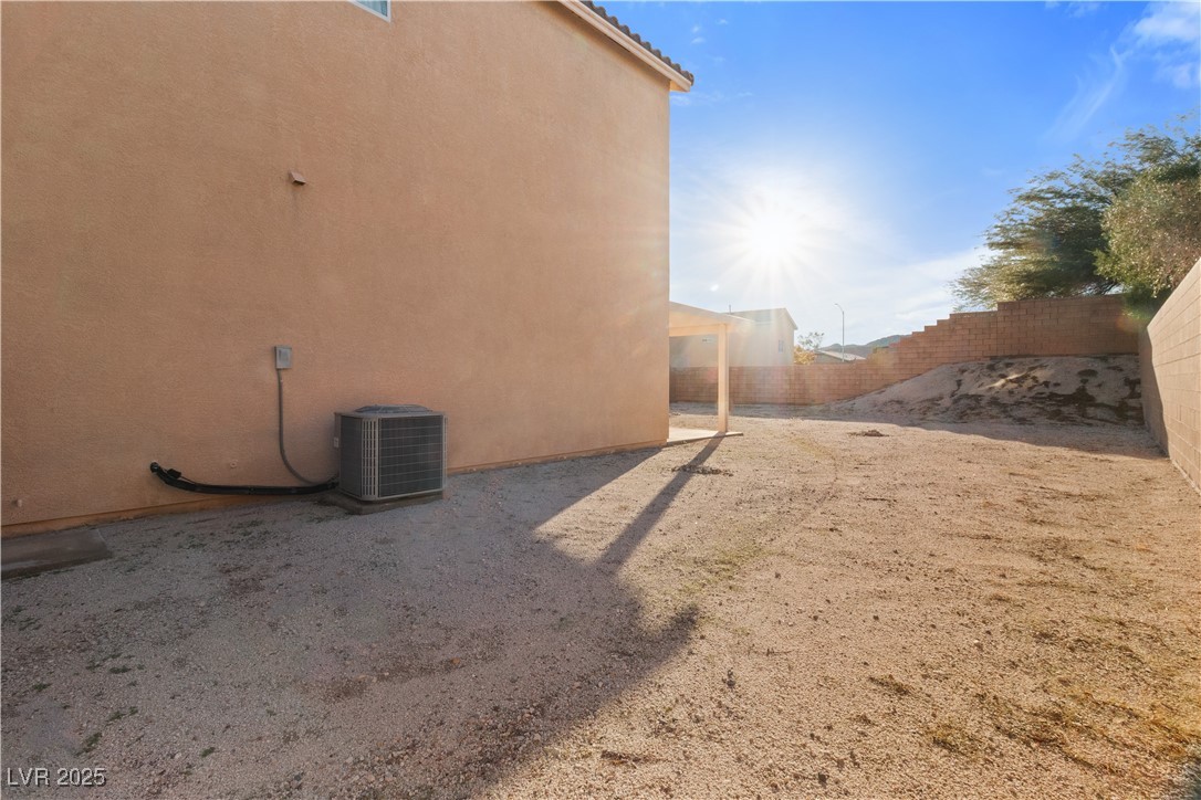 2715 Brinkley Manor Street Laughlin, NV 89029 - Photo 54 of 89 Fenced backyard with a patio area