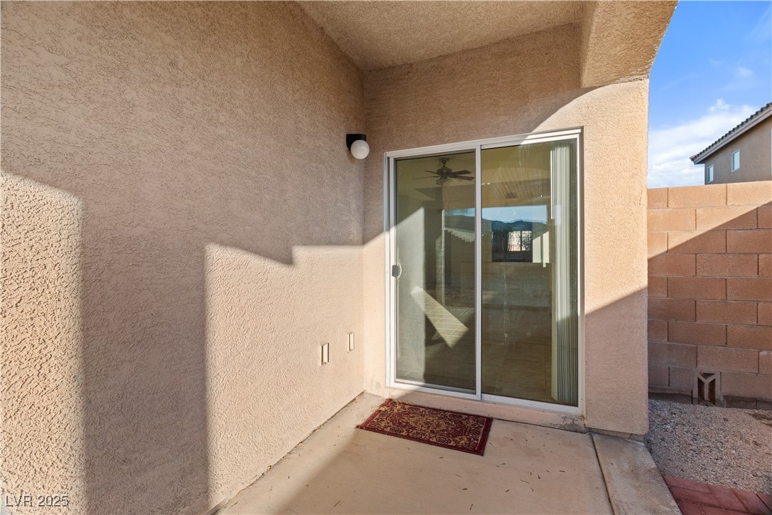 2715 Brinkley Manor Street Laughlin, NV 89029 - Photo 66 of 89 View of exterior entry featuring stucco siding