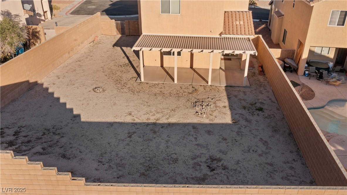 2715 Brinkley Manor Street Laughlin, NV 89029 - Photo 79 of 89 Fenced backyard with a patio area