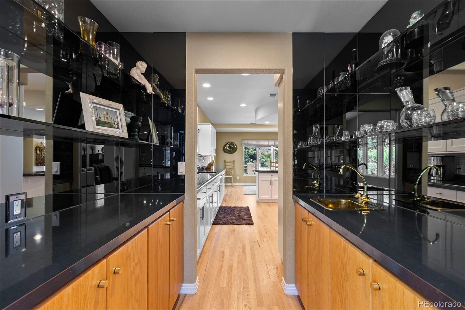 69 North Ranch Road Littleton, CO 80127 - Photo 14 of 50 a view of a living room with stainless steel appliances granite countertop lots of counter top space