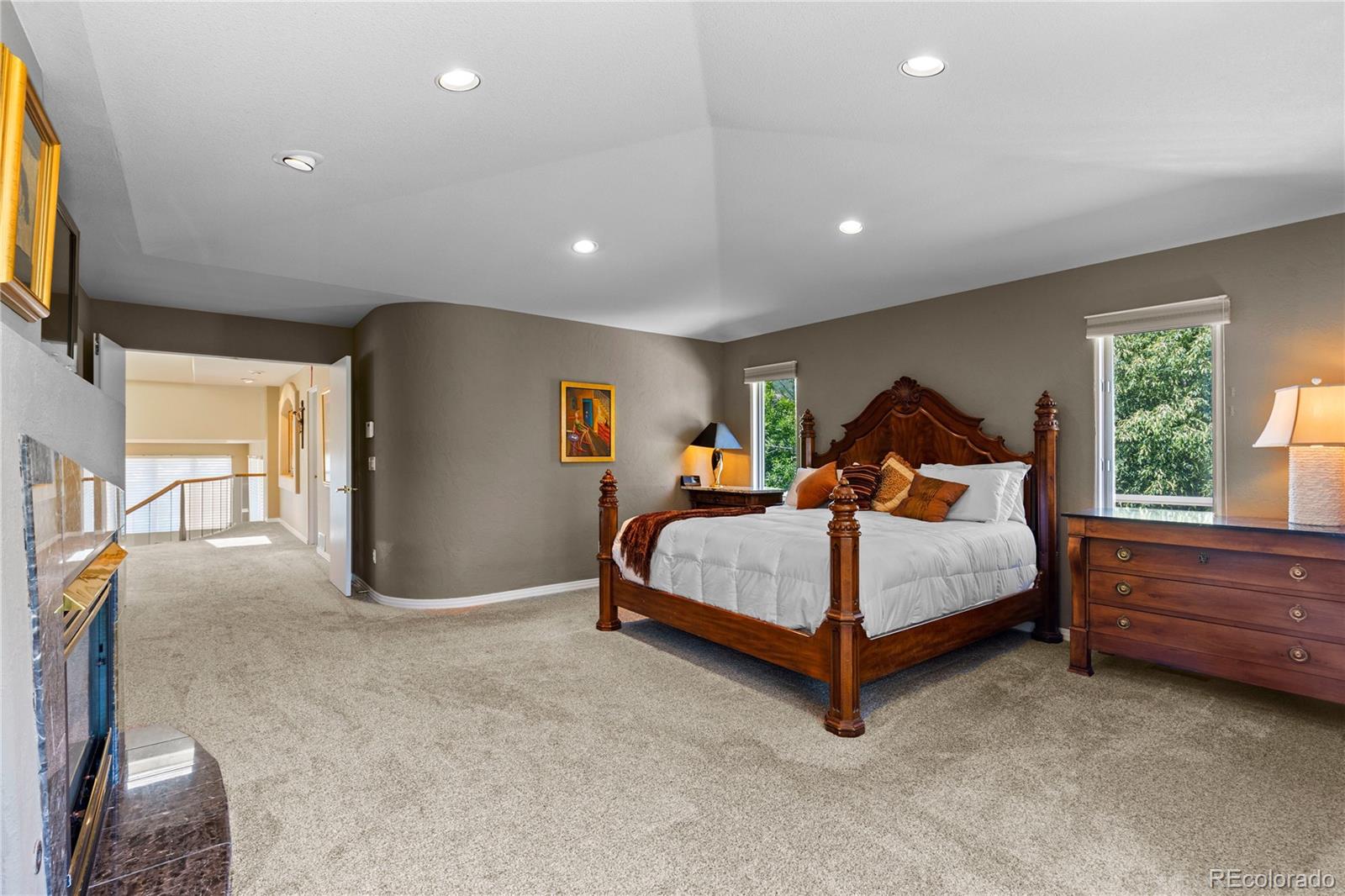 69 North Ranch Road Littleton, CO 80127 - Photo 21 of 50 a bed room with a bed and window