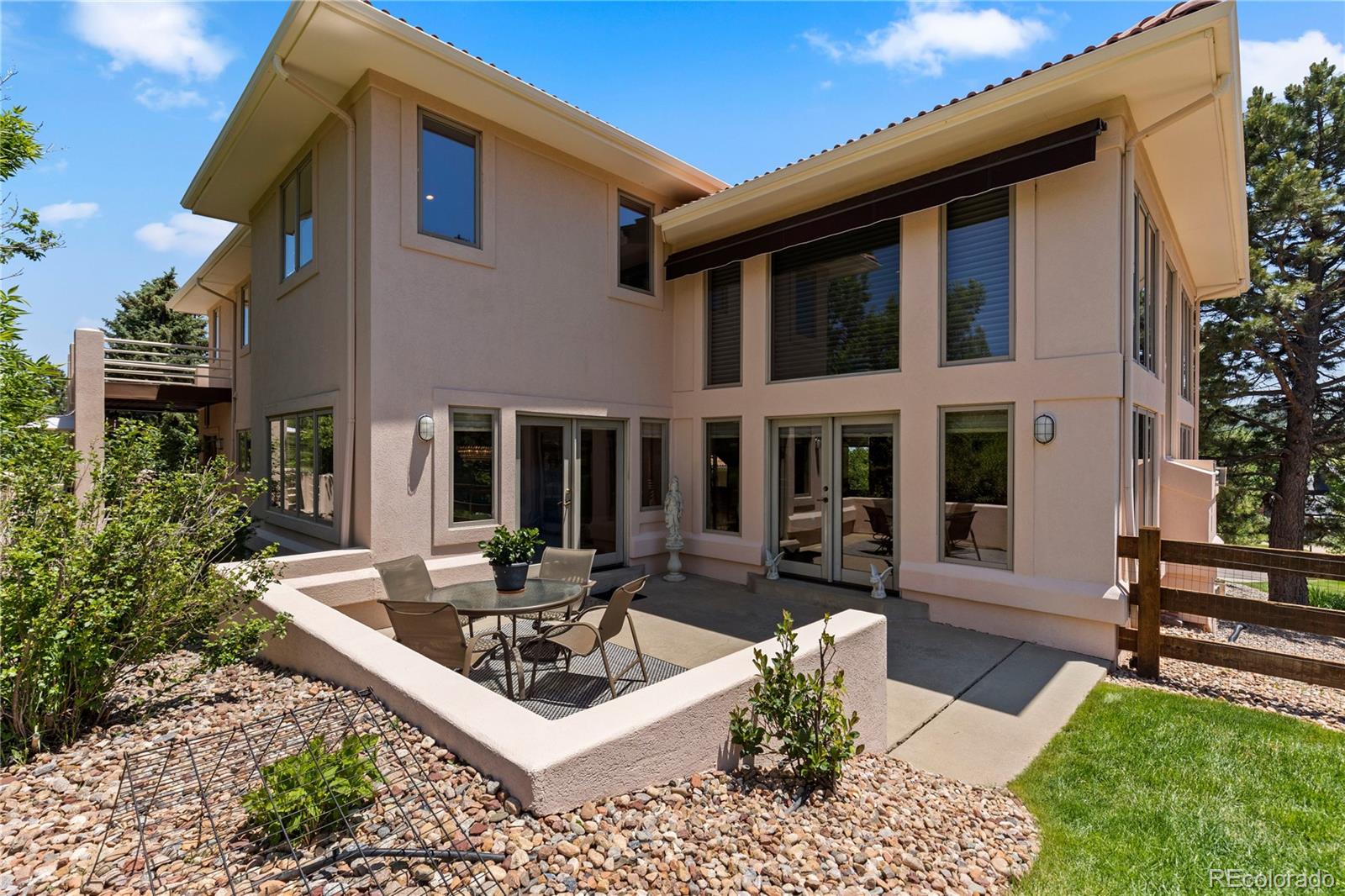 69 North Ranch Road Littleton, CO 80127 - Photo 44 of 50 front view of a house with a yard