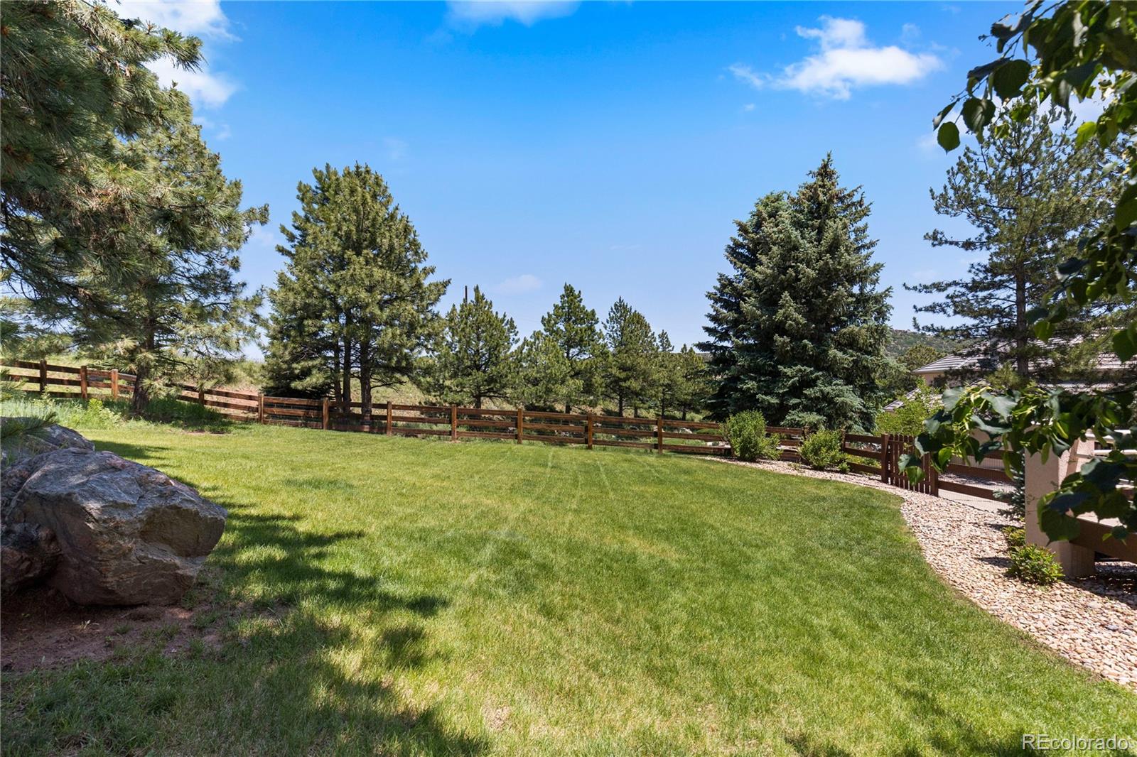 69 North Ranch Road Littleton, CO 80127 - Photo 49 of 50 a view of yard with green space