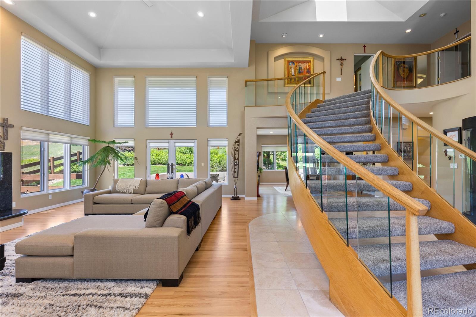 69 North Ranch Road Littleton, CO 80127 - Photo 6 of 50 a living room with furniture and wooden floor