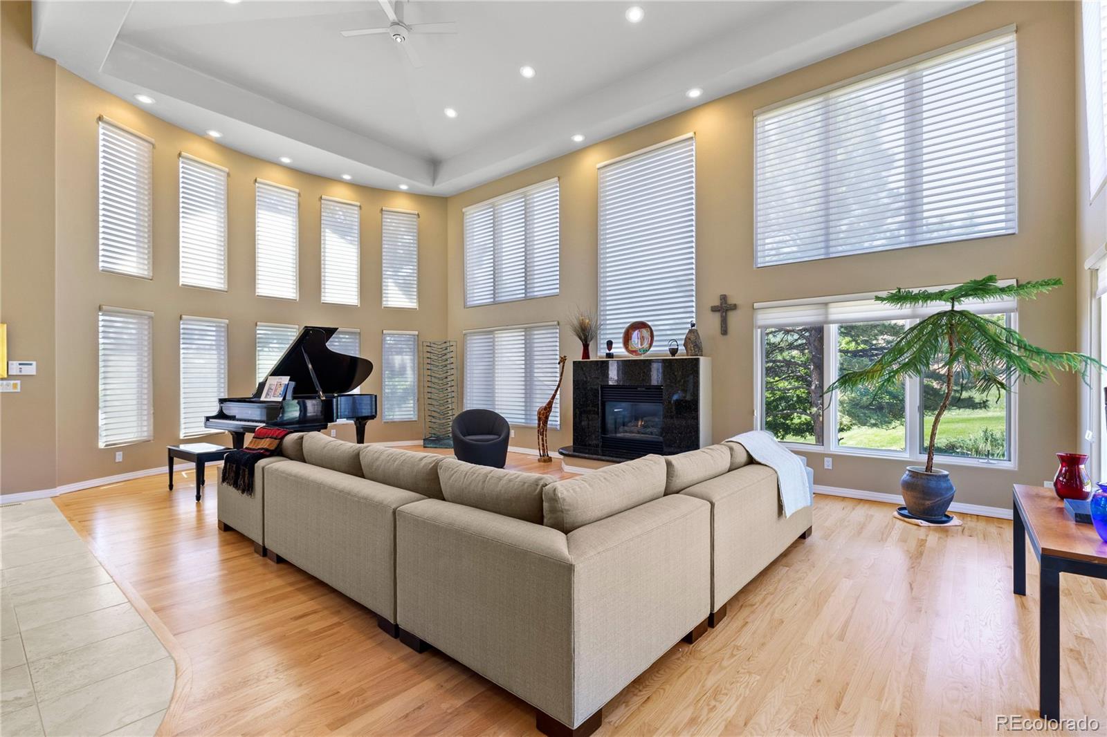 69 North Ranch Road Littleton, CO 80127 - Photo 9 of 50 a living room with furniture and a large window