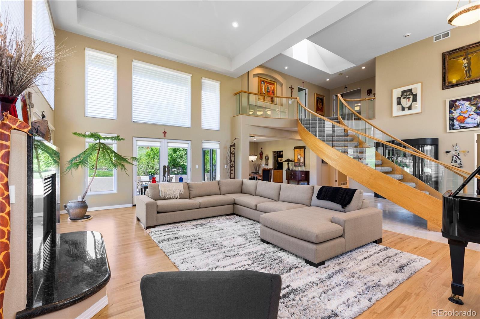 69 North Ranch Road Littleton, CO 80127 - Photo 10 of 50 a living room with furniture and a large window
