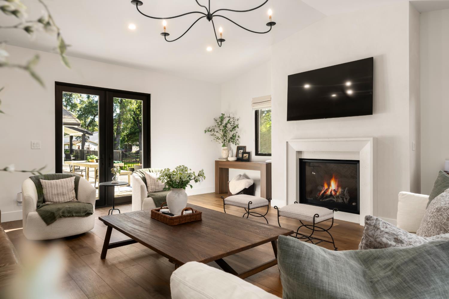 7697 Horseshoe Bar Road Loomis, CA 95650 - Photo 18 of 76 a living room with furniture fireplace and flat screen tv