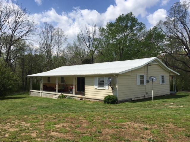60 Key West Road Westpoint, TN 38486 - Photo 3 of 25 a front view of a house with a garden