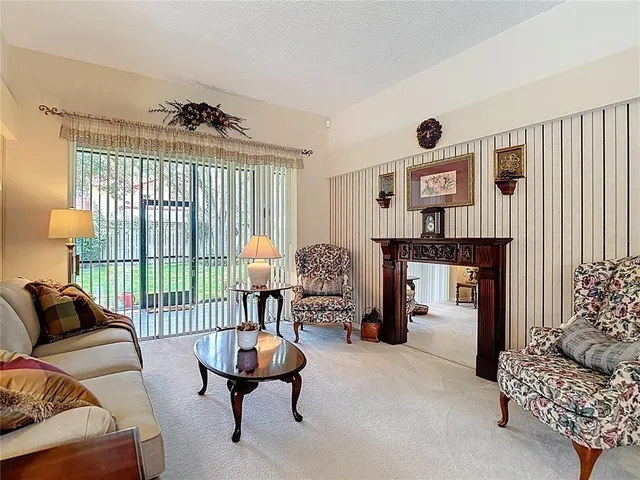 a view of a dining room with furniture wooden floor and chandelier