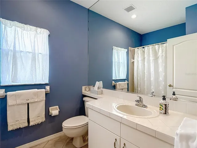 a front view of a house with a garage