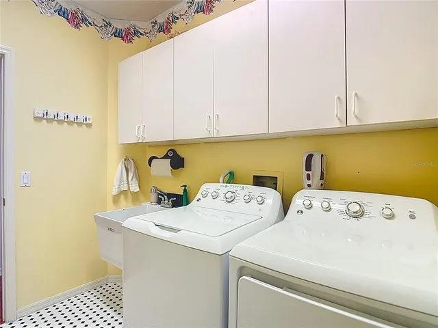 a view of dining room with furniture and wooden floor