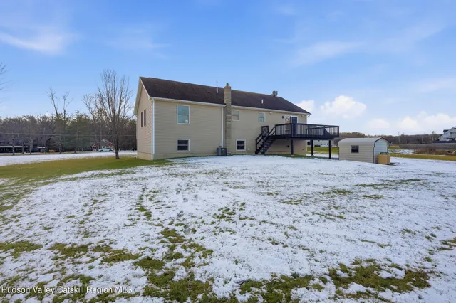 a view of a street with a yard