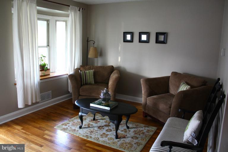 749 Arncliffe Road Baltimore, MD 21221 - Photo 11 of 20 a living room with furniture and a window