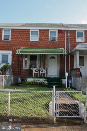 749 Arncliffe Road Baltimore, MD 21221 - Photo 19 of 20 a front view of a house with a yard