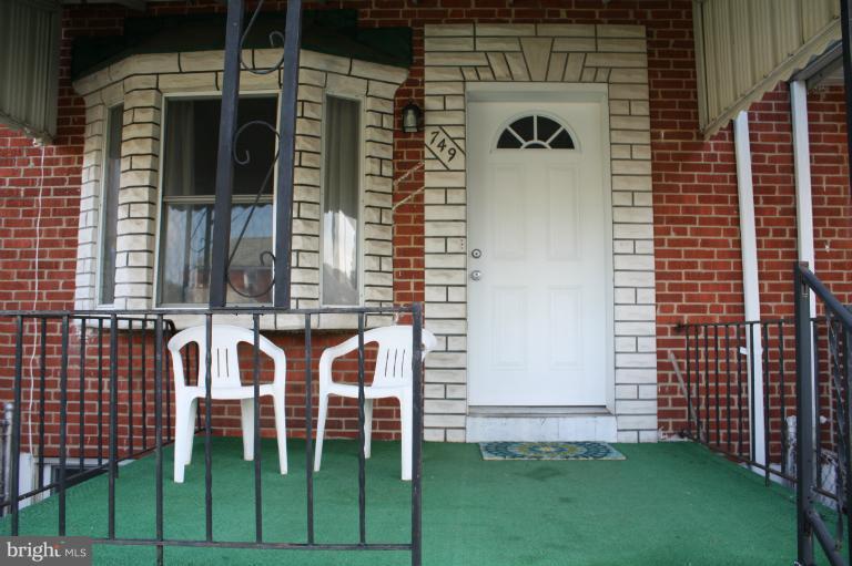 749 Arncliffe Road Baltimore, MD 21221 - Photo 20 of 20 front view of a house with a yard