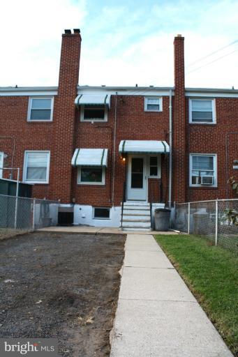 749 Arncliffe Road Baltimore, MD 21221 - Photo 10 of 20 a front view of a house with garden
