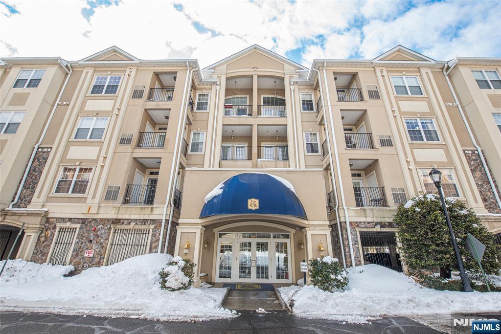 a front view of a multi story residential apartment building