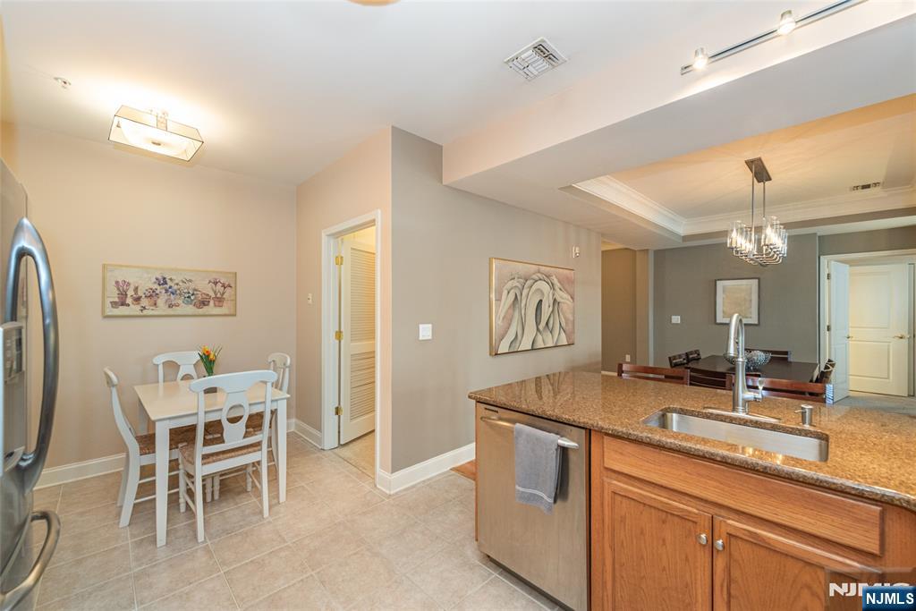 6105 Harcourt Road Clifton, NJ 07013 - Photo 11 of 23 a bathroom with a sink and a mirror