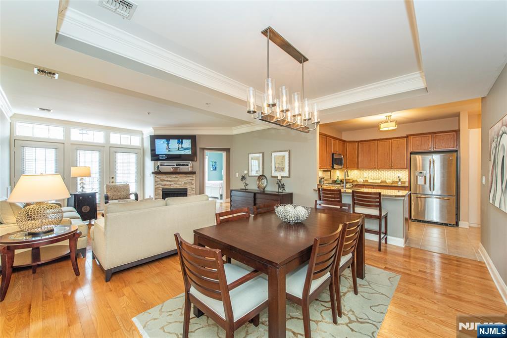 6105 Harcourt Road Clifton, NJ 07013 - Photo 12 of 23 a view of a dining room with furniture and wooden floor
