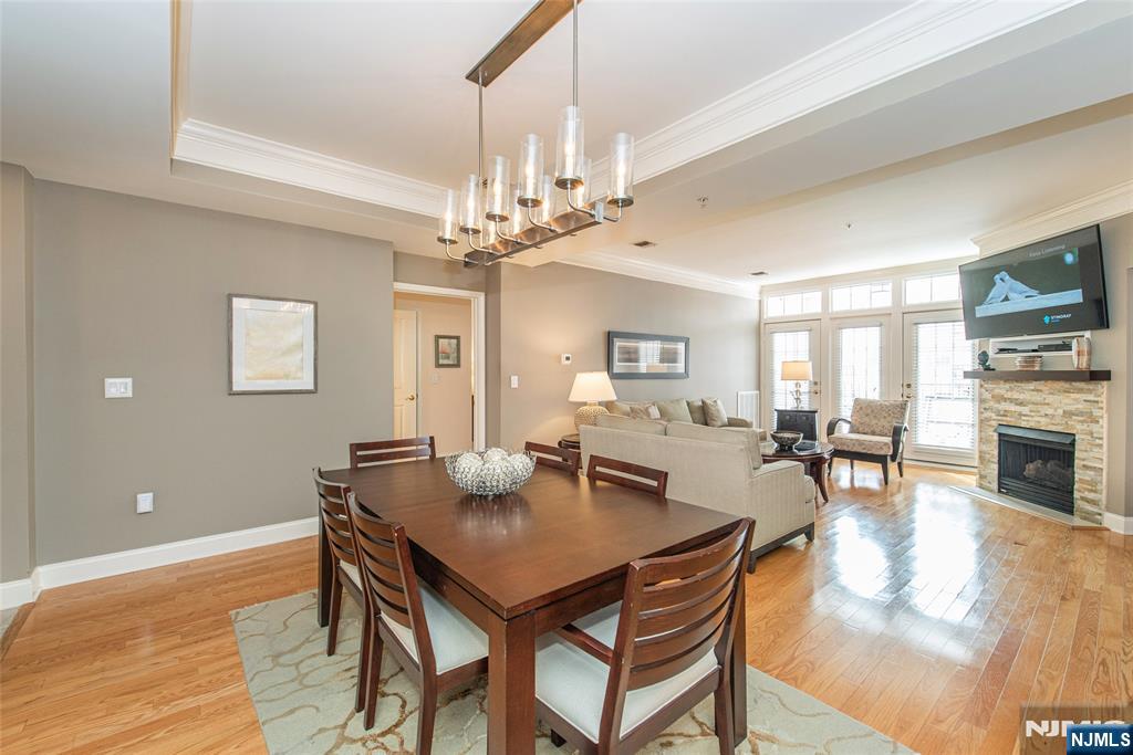 6105 Harcourt Road Clifton, NJ 07013 - Photo 13 of 23 a view of a dining room with furniture and wooden floor
