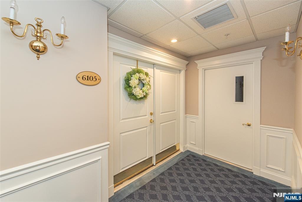 6105 Harcourt Road Clifton, NJ 07013 - Photo 3 of 23 a view of an entryway with wooden floor