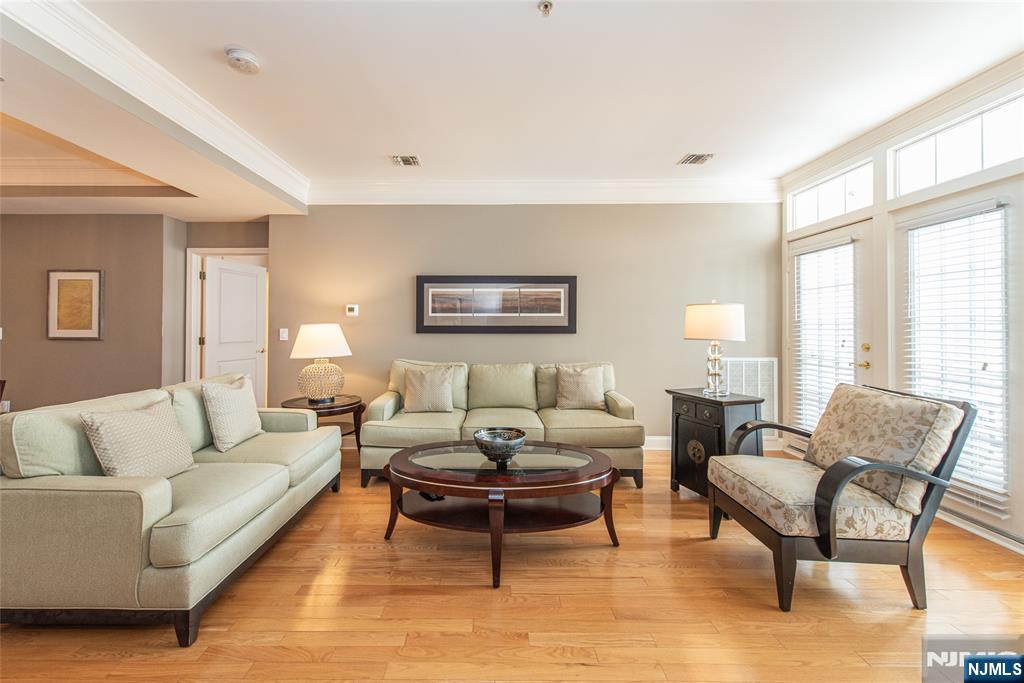 6105 Harcourt Road Clifton, NJ 07013 - Photo 6 of 23 a living room with furniture and a large window