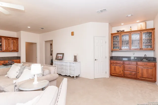 a large white bed in a white room