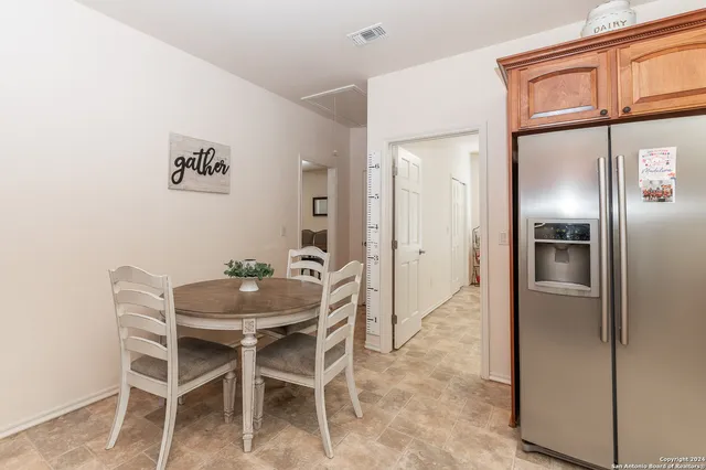 a view of a dining room with furniture