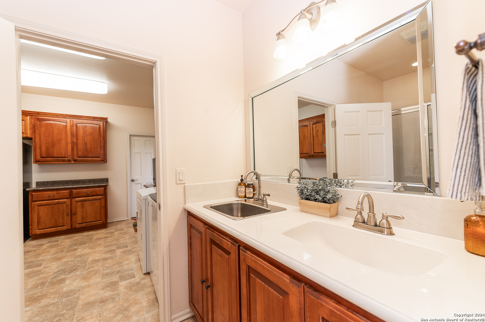 511 County Road 423 D'Hanis, TX 78850 - Photo 18 of 47 a bathroom with a sink and a mirror