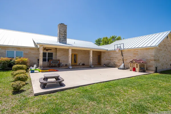 a front view of a house with patio