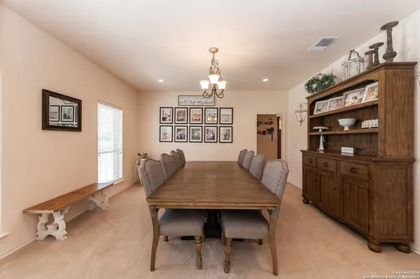 a view of a dining room with furniture