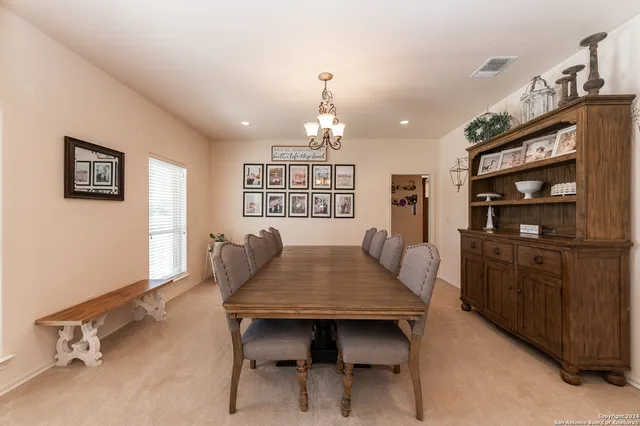 a view of a dining room with furniture