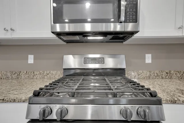 a view of livingroom with furniture and windows