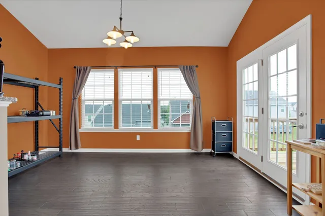 a bathroom with a sink a mirror and vanity