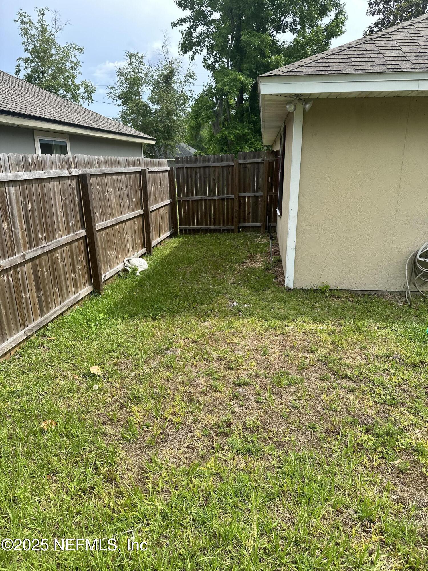 1000 Fleming Street Fleming Island, FL 32003 - Photo 14 of 17 a view of a backyard