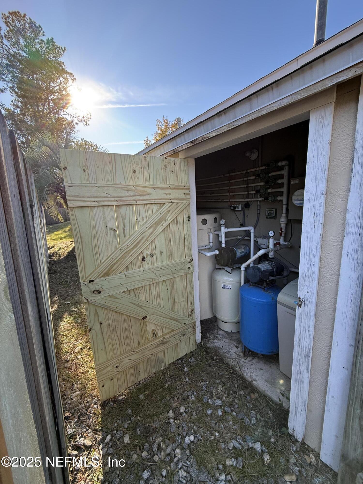 1000 Fleming Street Fleming Island, FL 32003 - Photo 15 of 17 a view of storage and utility room