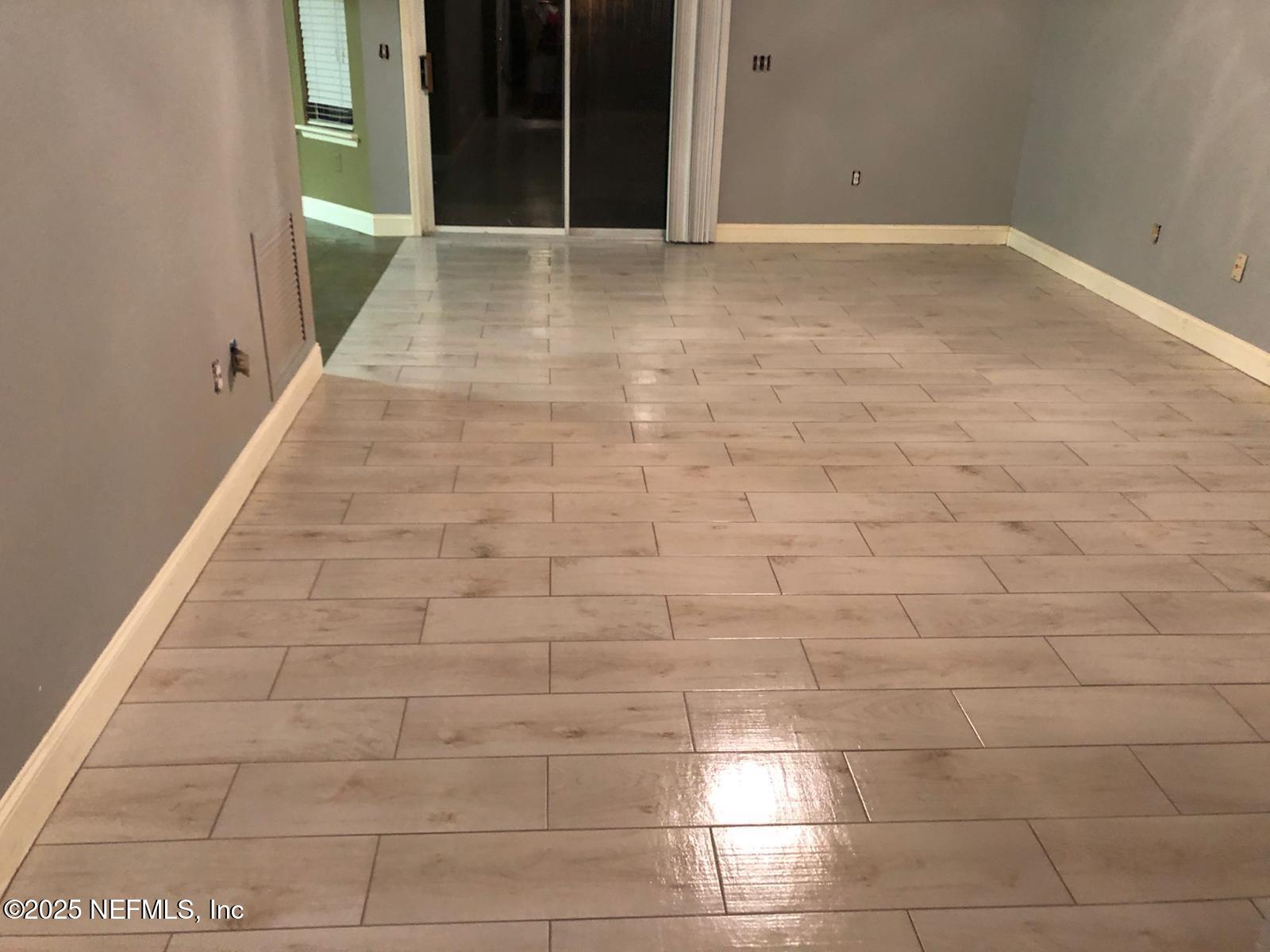 1000 Fleming Street Fleming Island, FL 32003 - Photo 3 of 17 a view of an empty room with stairs