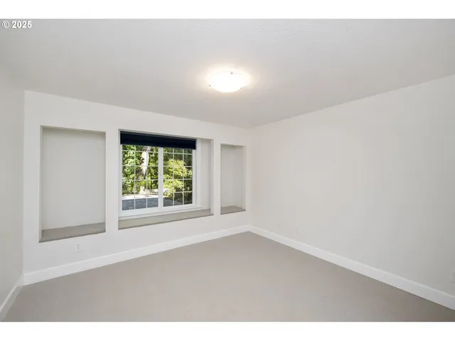 a kitchen with wooden cabinets and sink