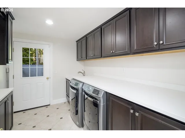 a view of empty room with windows