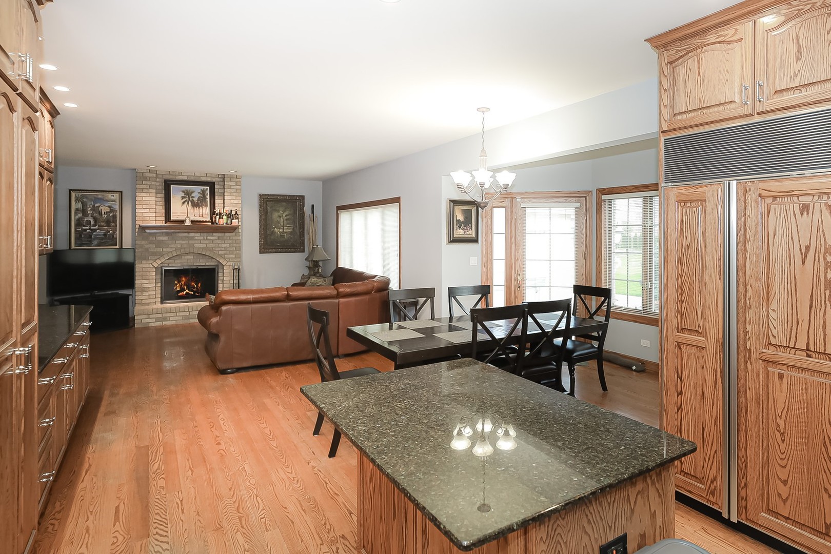 307 79th Street Burr Ridge, IL 60527 - Photo 17 of 41 a living room with furniture and a table