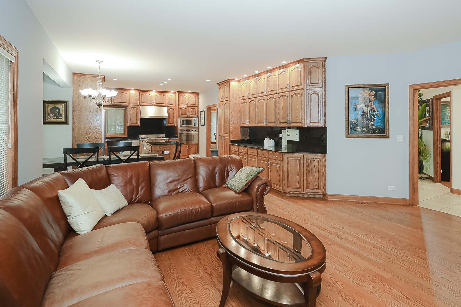 307 79th Street Burr Ridge, IL 60527 - Photo 19 of 41 a living room with furniture a couch and a table