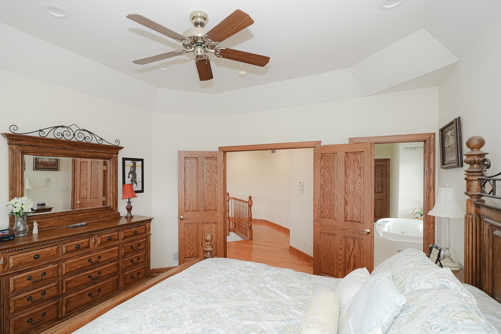 307 79th Street Burr Ridge, IL 60527 - Photo 21 of 41 a bedroom with a bed and a dresser