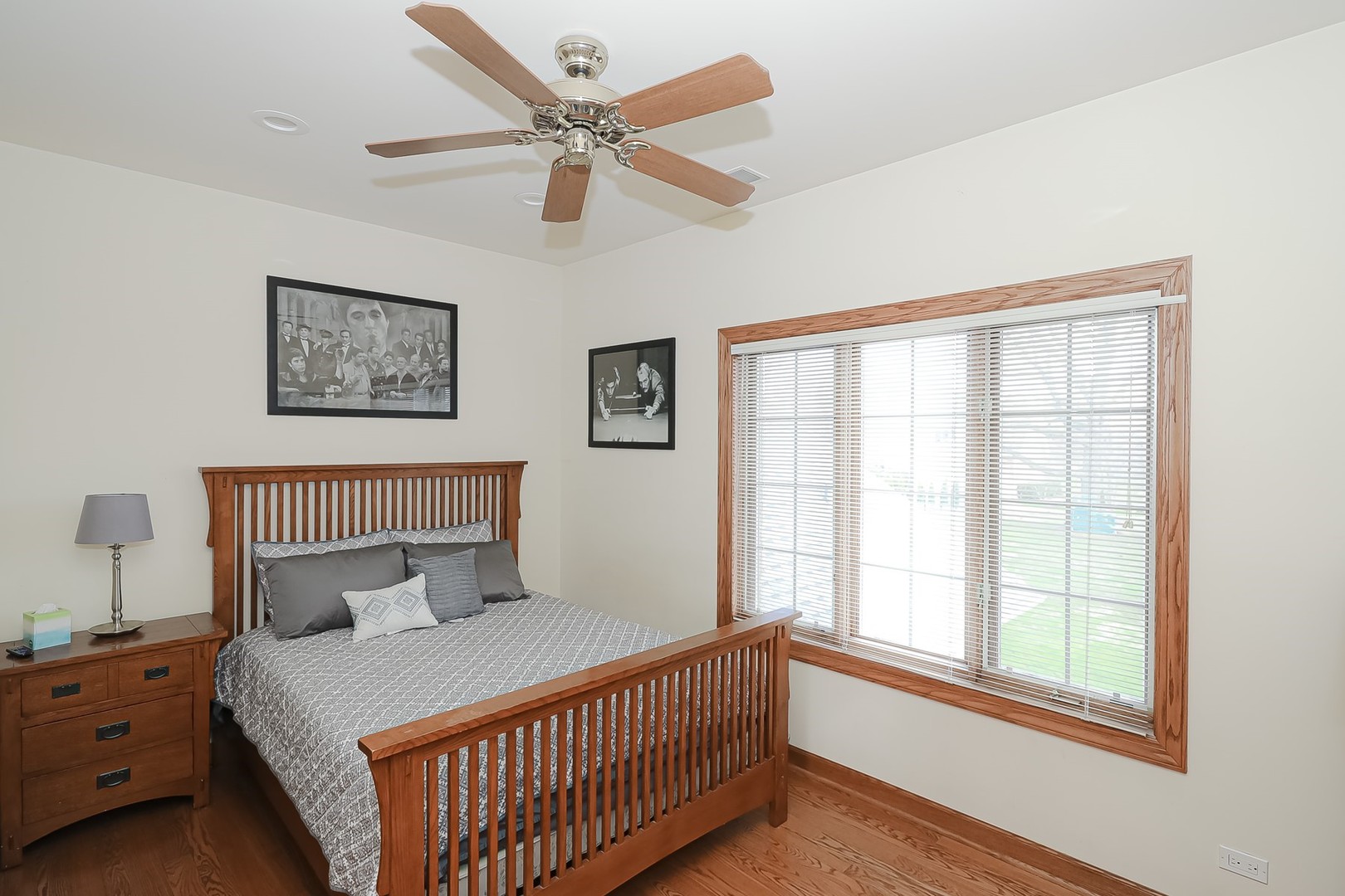 307 79th Street Burr Ridge, IL 60527 - Photo 28 of 41 a bedroom with a large bed and a window