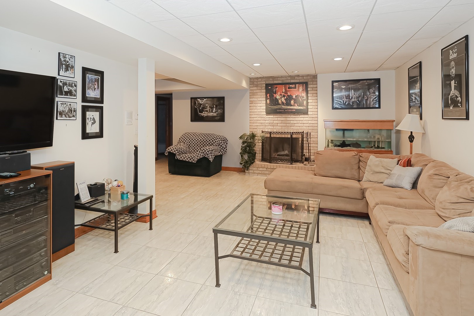 307 79th Street Burr Ridge, IL 60527 - Photo 32 of 41 a living room with furniture and a flat screen tv